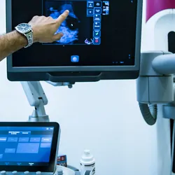 Doctor pointing to a mammogram