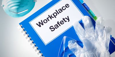 Photo of an OSHA workplace health and safety manual.