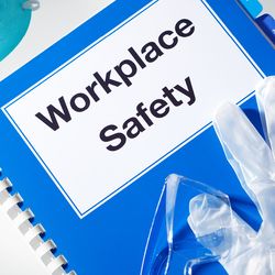 Photo of an OSHA workplace health and safety manual.