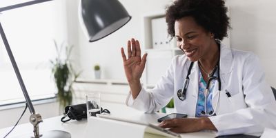 Doctor working at her office doing telemedicine services