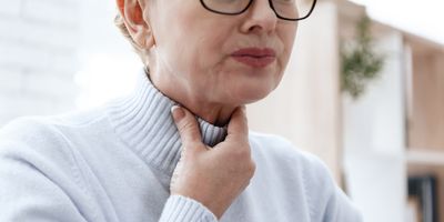 A woman has a sore throat. She has no voice