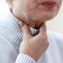 A woman has a sore throat. She has no voice