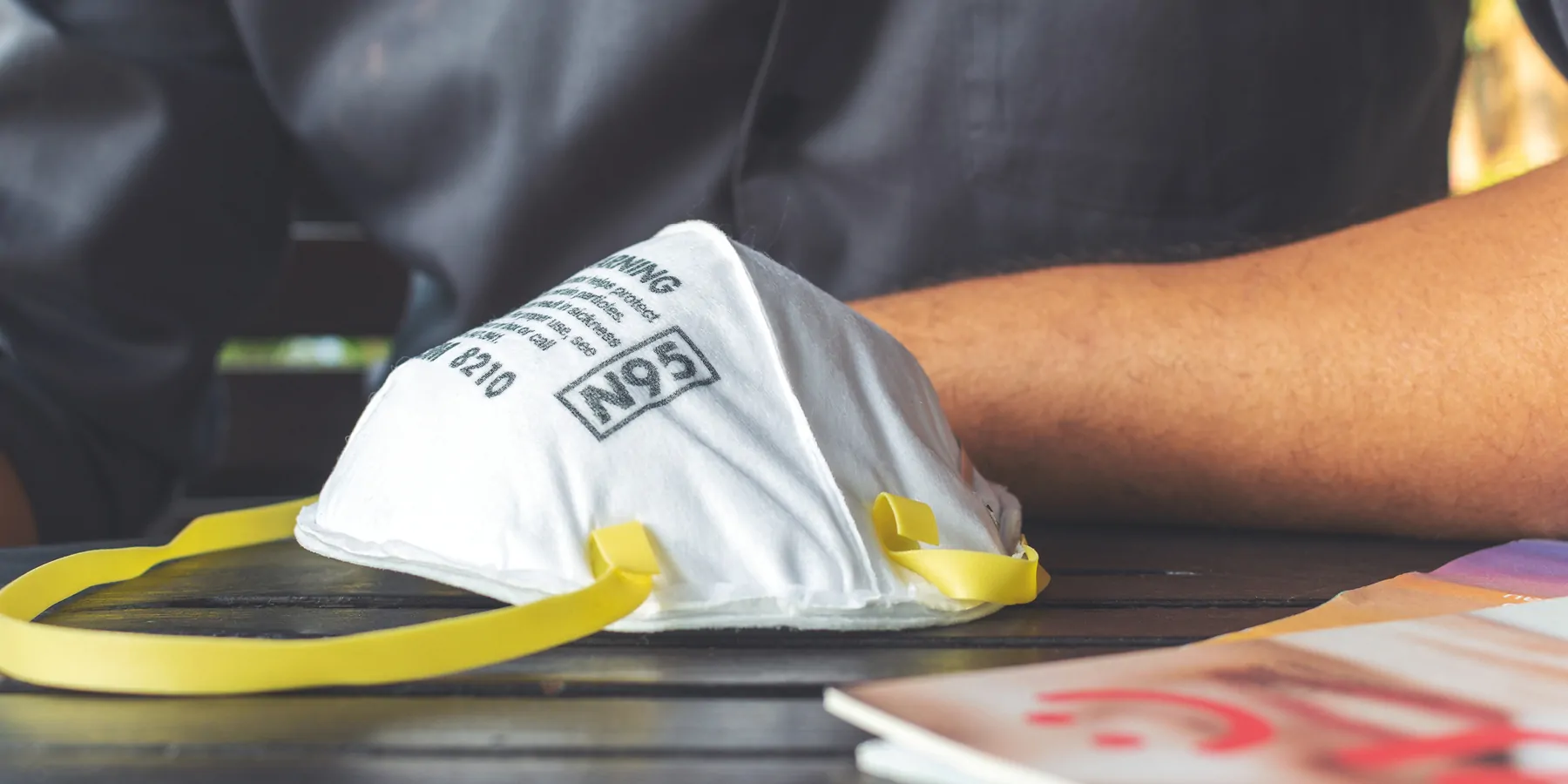 FDA Removes N95 Respirators from Medical Device Shortage List Closeup of N95 air filter mask on a table