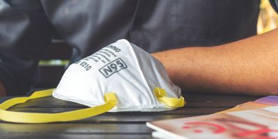 Closeup of N95 air filter mask on a table