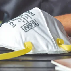 Closeup of N95 air filter mask on a table