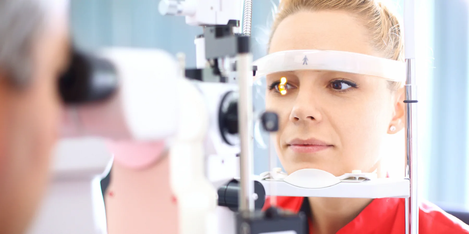 New Diagnostic Option for Rare Eye Disease Closeup of late 20's blond woman visiting optician