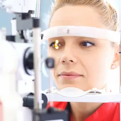 Closeup of late 20's blond woman visiting optician