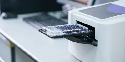 An ELISA plate reader used to observe expression in samples