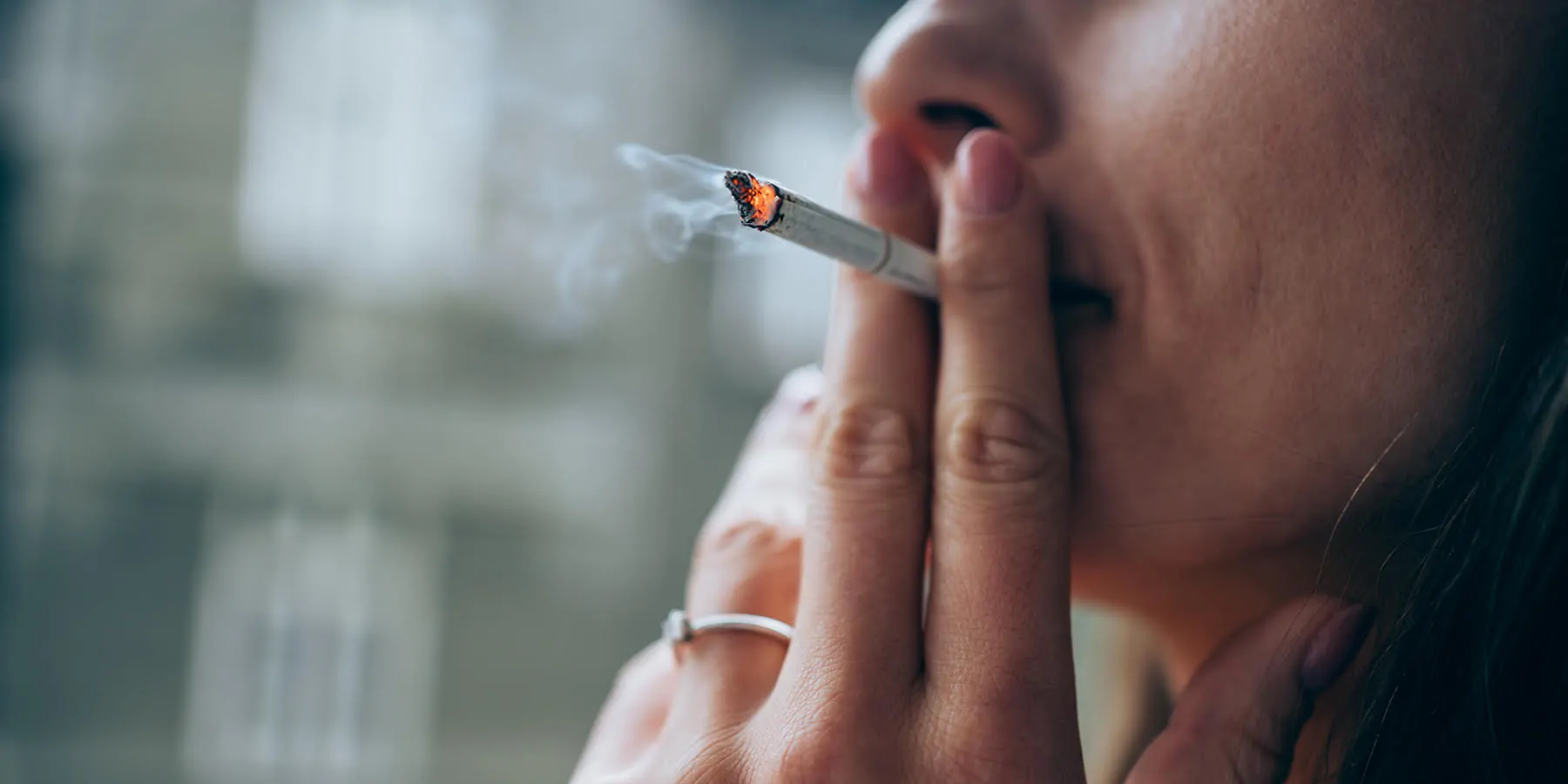 Close up on women smoking