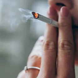Close up on women smoking