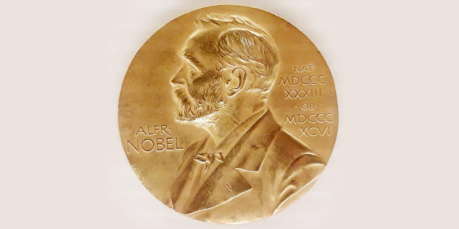 2022 Nobel Prize in Physiology and Medicine Awarded to Svante Pääbo The Nobel Prize medal on a white background