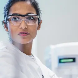 Laboratory professional analyzing cancer NGS results
