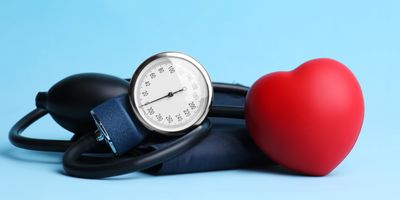 Blood pressure monitor on a blue background