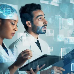 Two clinicians looking at holographic data