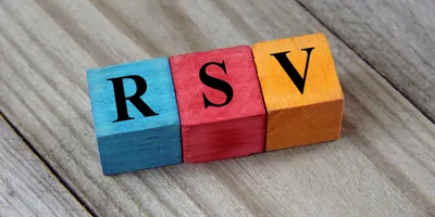 Wooden blocks spelling "RSV"