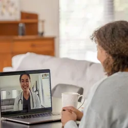Person at home receiving telemedicine care