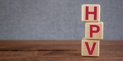 Wooden blocks with the letters "HPV"