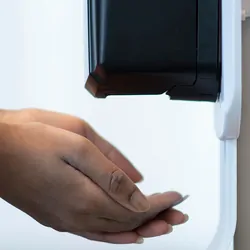 Women using a hand sanitizer