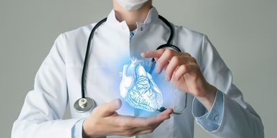 Doctor holding a holographic image of a human heart