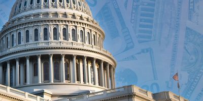 Photo of the US Congress on a background with US dollar bills.