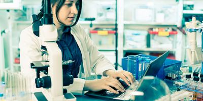 Scientist inputting data