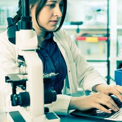 Scientist inputting data