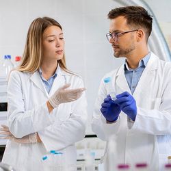 Scientists analyzing sample