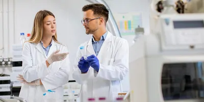 Scientists analyzing sample
