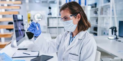 Clinical professional analyzing sample