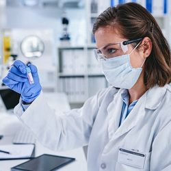 Clinical professional analyzing sample