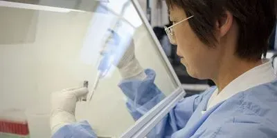 NIAID Vaccine Research Center scientist working in lab