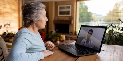 Older patient receiving health care via telemedicine