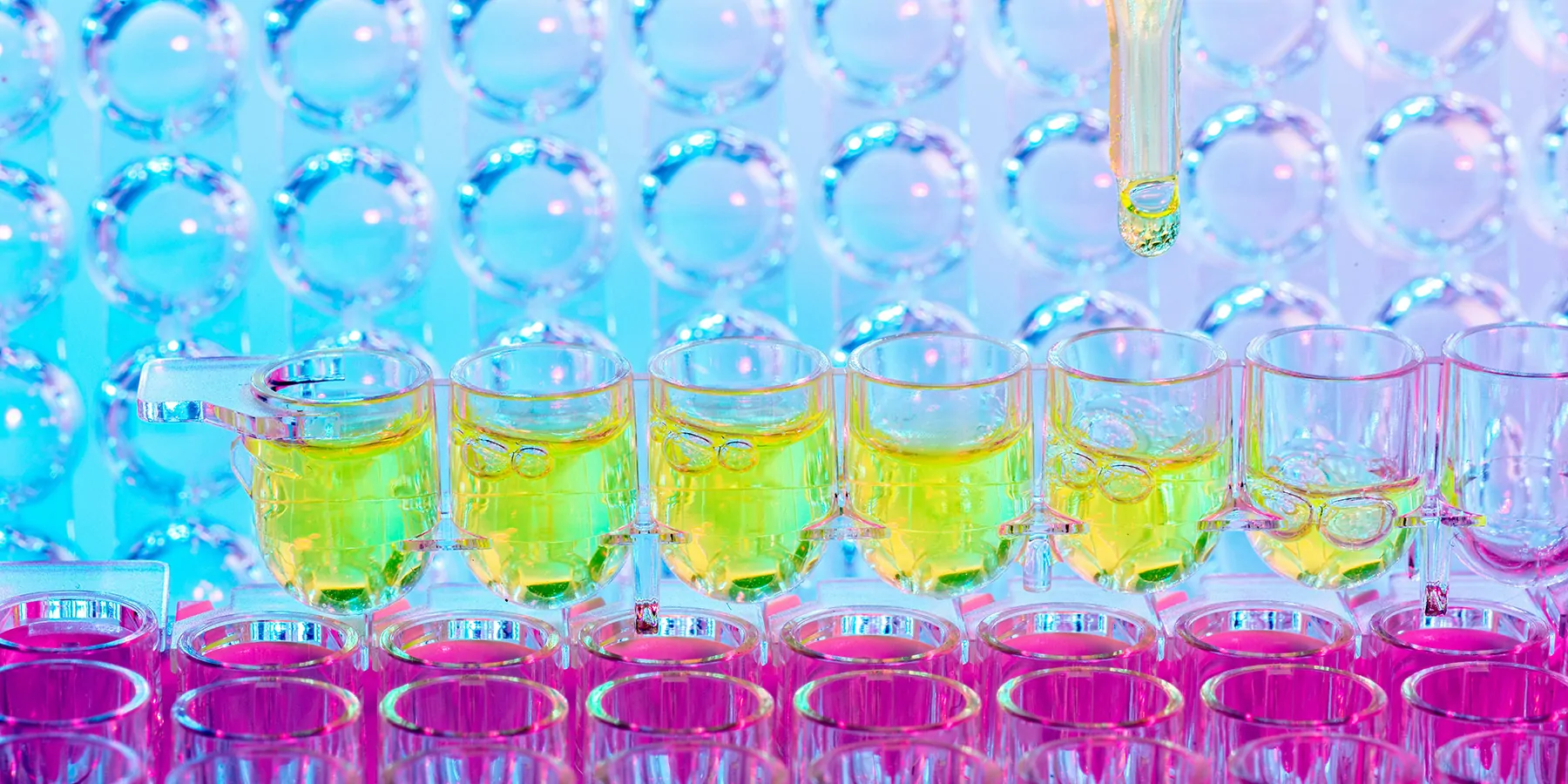 The Power of RNA in Detecting Gene Fusions for Cancer Diagnostics Close up on a pipette and sample tray of RNA