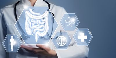 Female clinician holding graphic virtual visualization model of human intestine with multiple medical icons in the background.