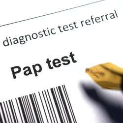 A close-up of a Medical diagnostic test referral form for Pap test  and a bar code