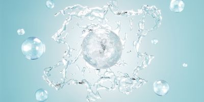 Water droplets against blue background