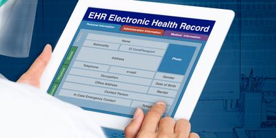 Picture looking through the shoulder of a clinician working on electronic health record on a digital tablet