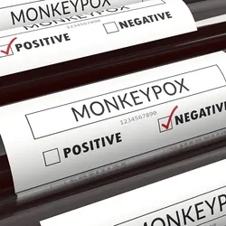 Monkeypox negative result area checked with red highlighter on blood test tubes on blue background.