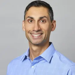 Photo portrait of Aric Joneja, PhD