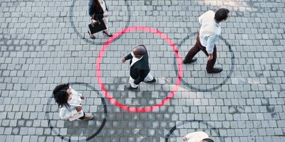 Individuals walking on a pathway