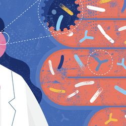 Lab technician viewing sample from intestine