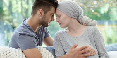 Loving supporting husband and his pregnant wife dealing with cancer