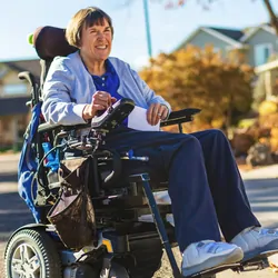 Active Caucasian woman uses a wheelchair and lives life to the fullest