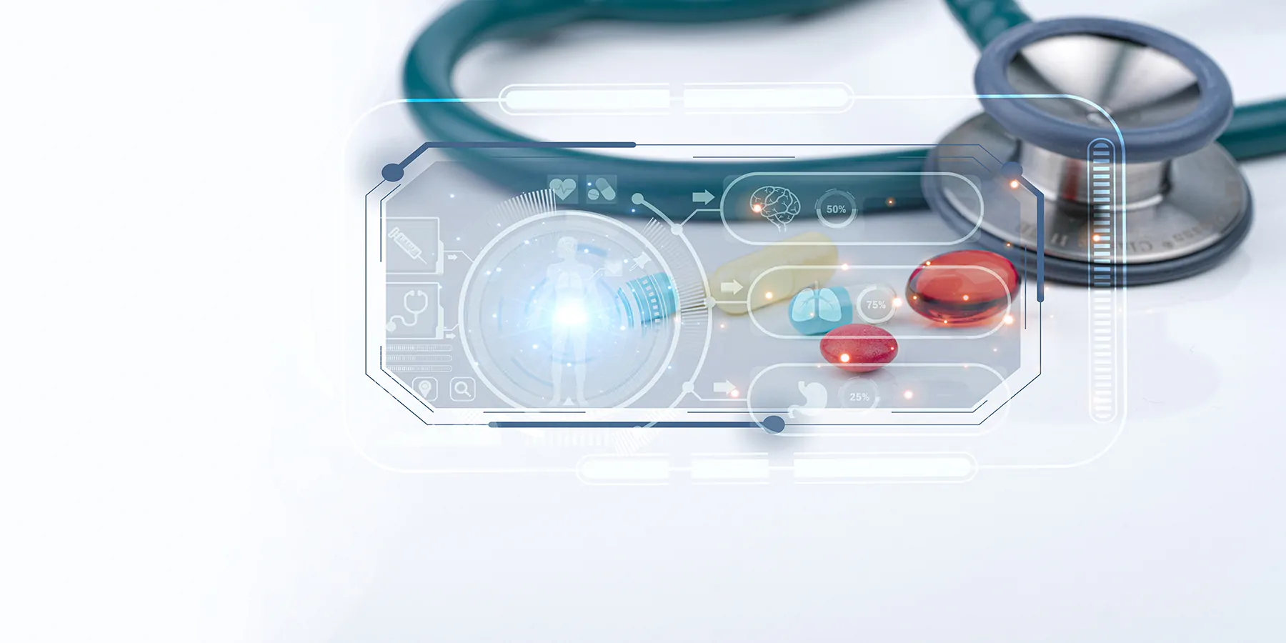 Electronic display showing human body divided into specific components with light shining from the center. Teal stethoscope displayed in the background behind display on a white surface.