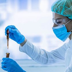 a scientist conducting experiments in the lab