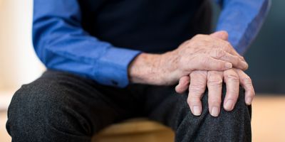 Close up of a senior male with Parkinson's disease.