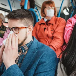 People using public transportation every day wearing facial masks against diseases and flu.