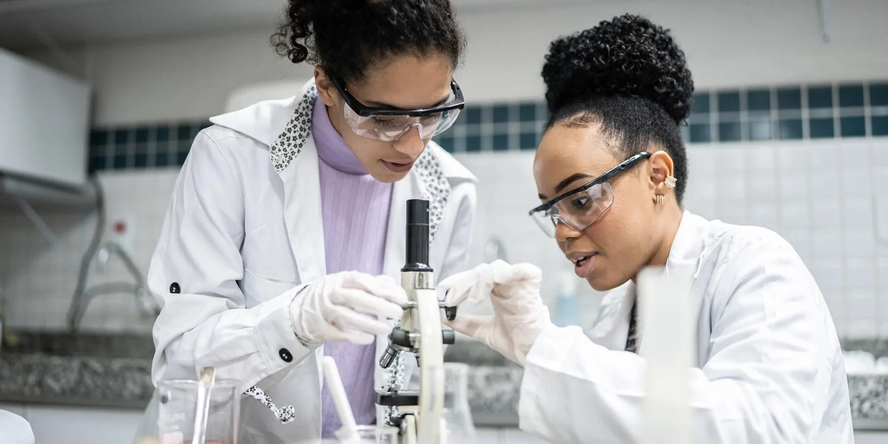 UGA to Offer New PhD Program in Regenerative Bioscience Two female students using the microscope in the laboratory.