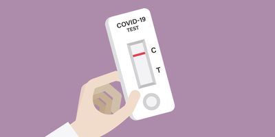 Hand holding a COVID-19 rapid test with a negative result stock illustration.