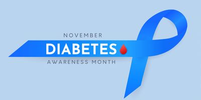 Banner with a blue ribbon and the words, November Diabetes Awareness Month.